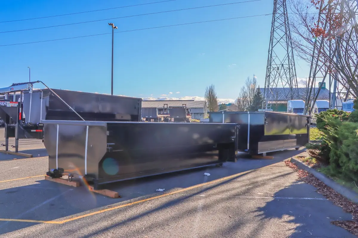 Roll-off dumpster ready for waste disposal at job site for 40 Yard Dumpster Rental in Fountainebleau